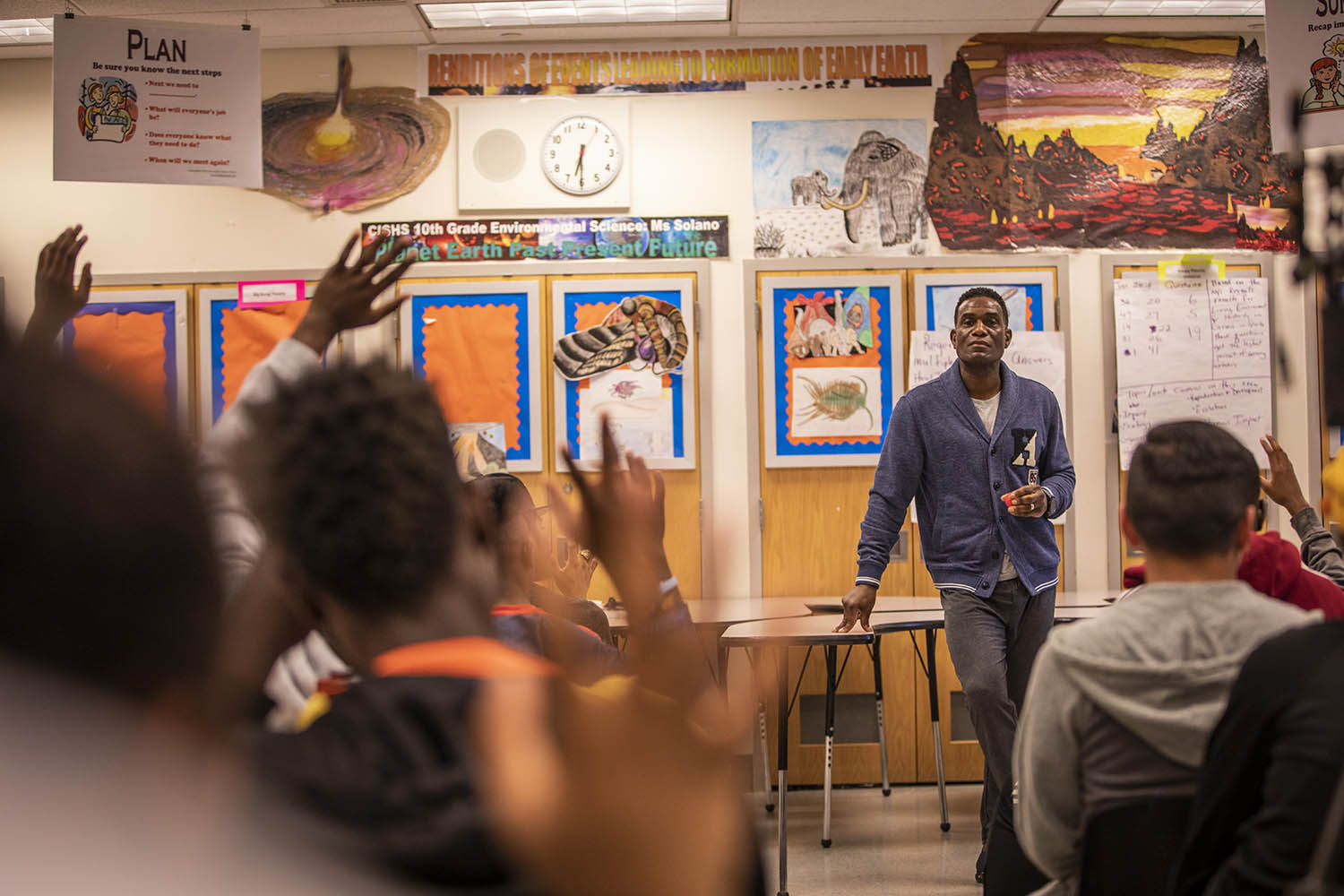 Robbie Earle speaks with athletes, South Bronx United